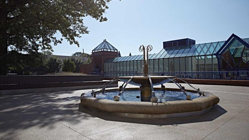 Exterior campus shot of Wriston Art Gallery and fountain