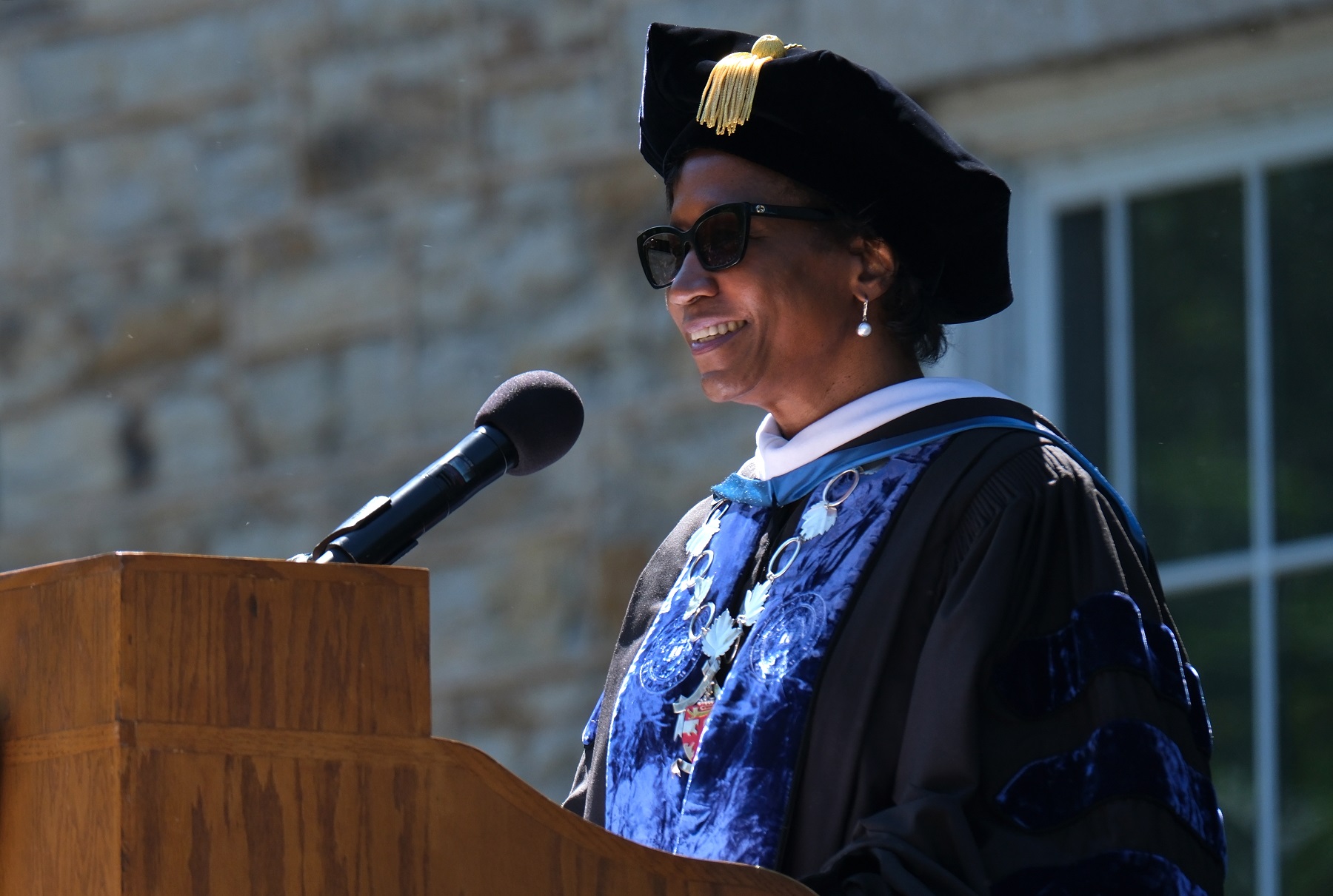 President Laurie A. Carter speaks at the podium.