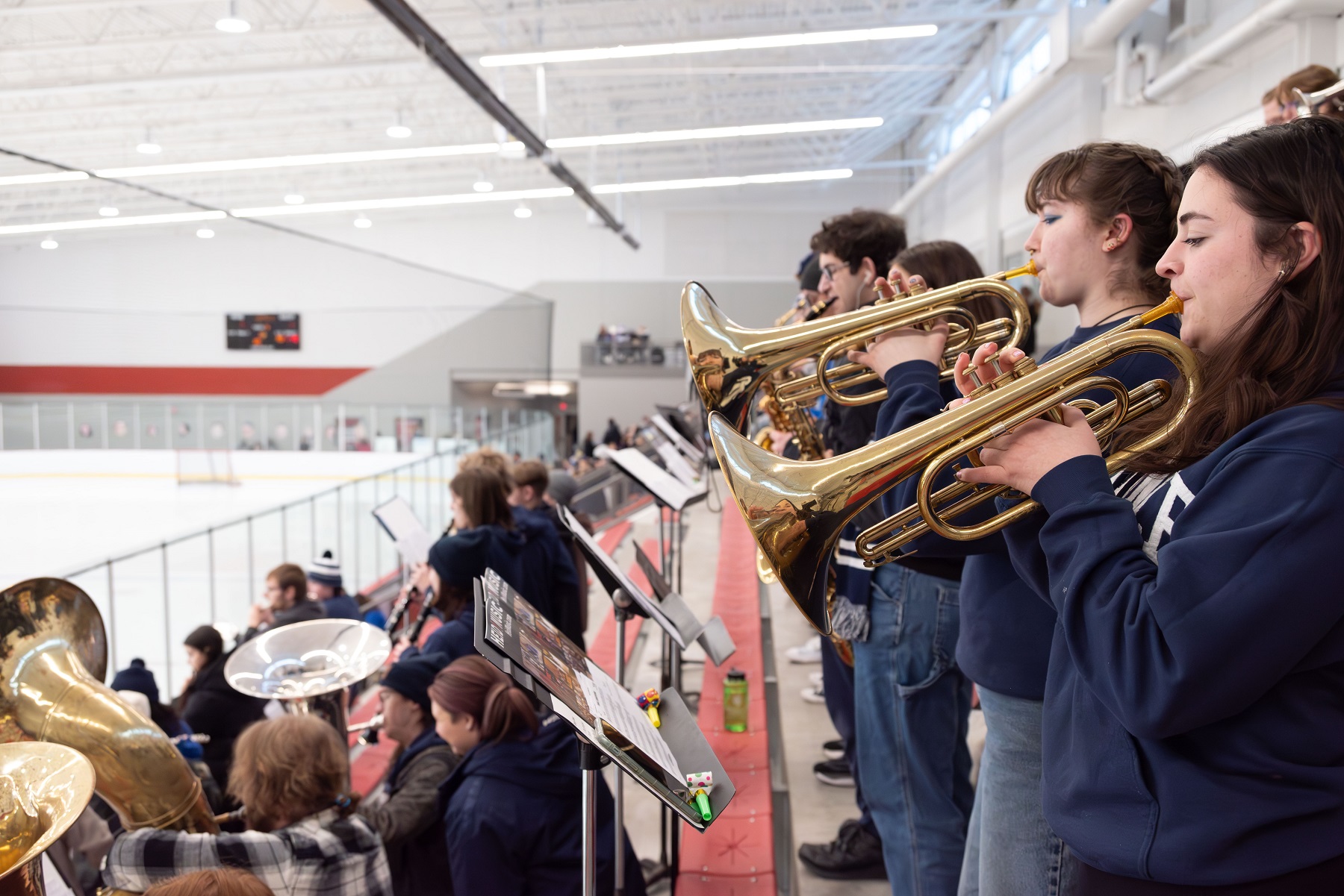 The Lawrence University Pep Band performs at a women's hockey game in January. 