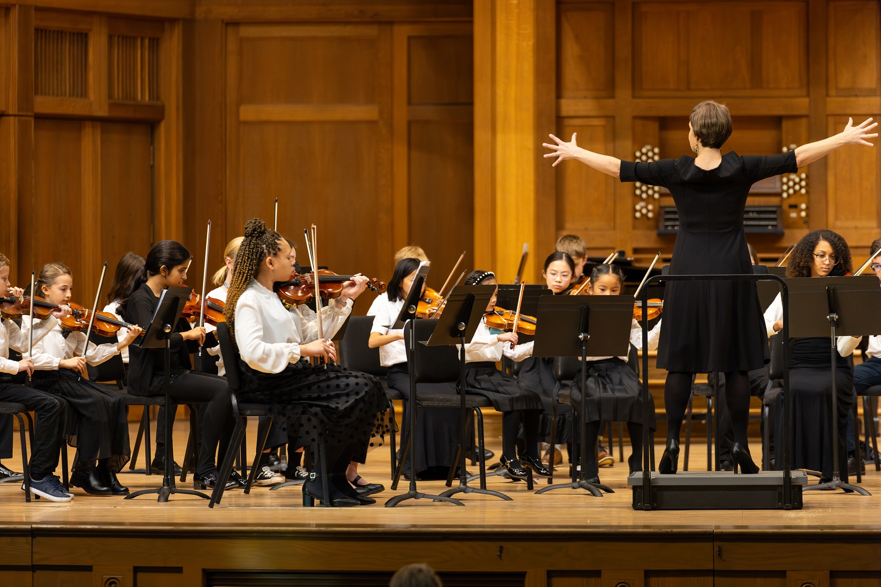 Young students perform in a Lawrence Community Music School concert in Memorial Chapel.