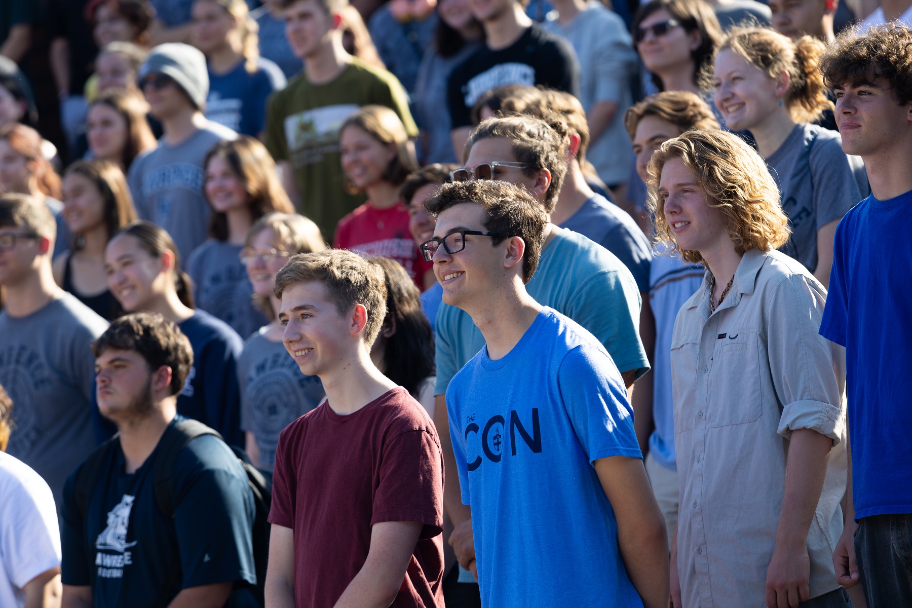 First-year students pose for a Class of 2028 photo outside of the Wriston Art Center.