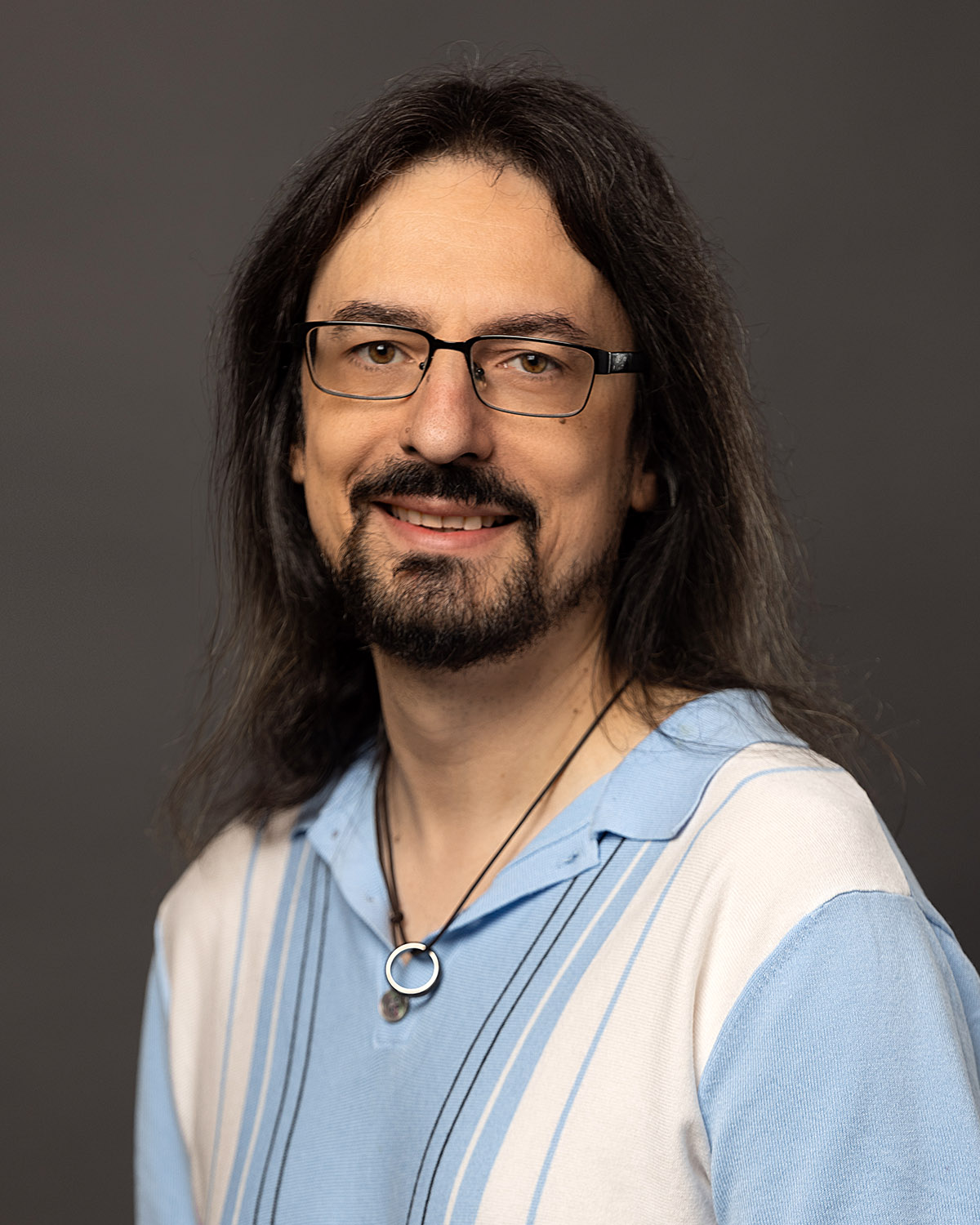 Headshot of Kivie Cahn-Lipman, associate professor of music (cello).