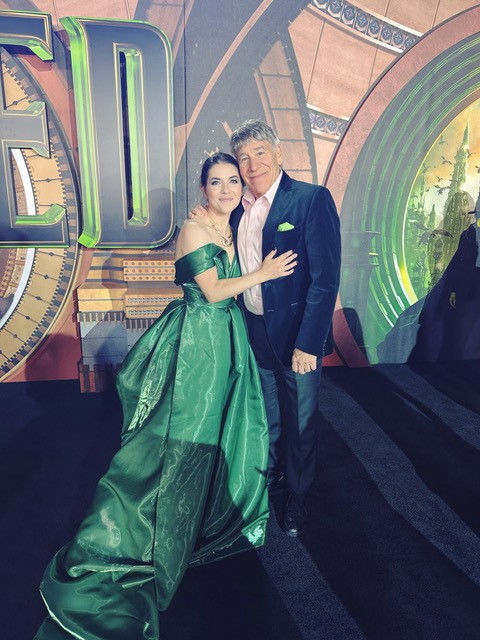 Caitlin Gallogly '08 joins "Wicked" composer Stephen Schwartz at the movie's Los Angeles premiere.