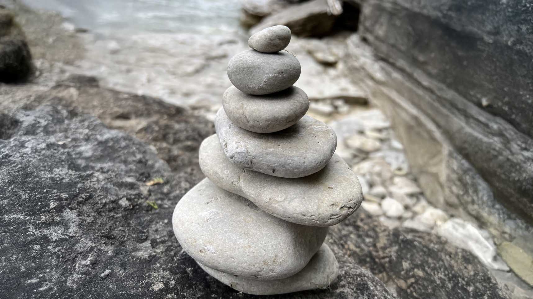 Stones stacked up on a stone surface