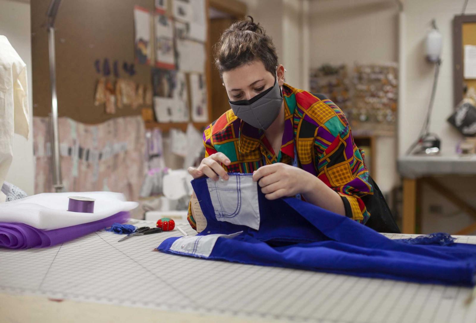 Zhanna Weil, sophomore, works in the costume shop in preparation for Molière Inspired.