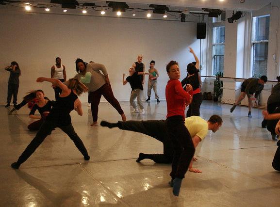 People dancing in a large room