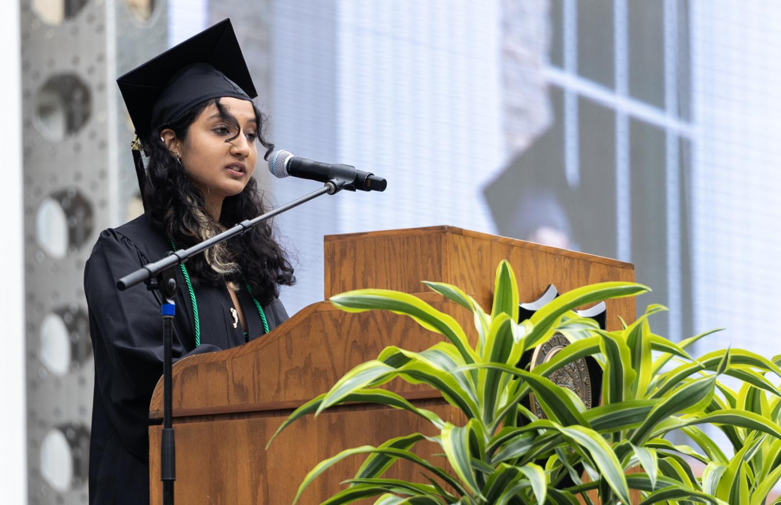 Tee Karki '23 speaks to her classmates as the senior class speaker. 