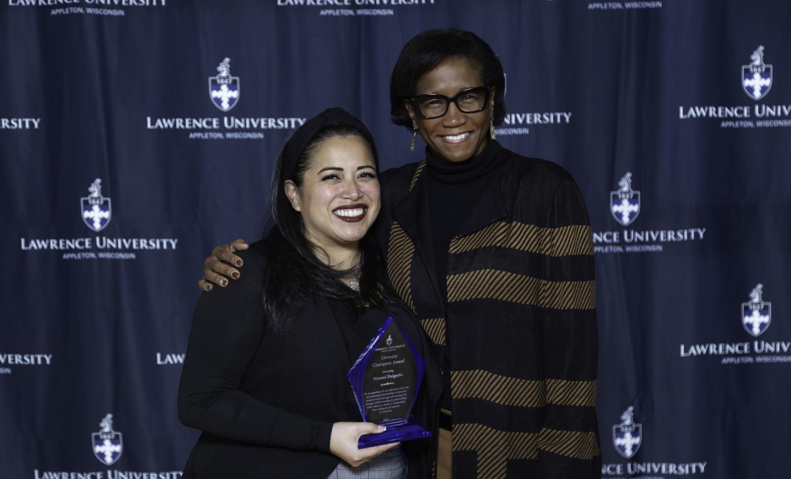 Noemi Delgado poses for a photo with President Laurie Carter.