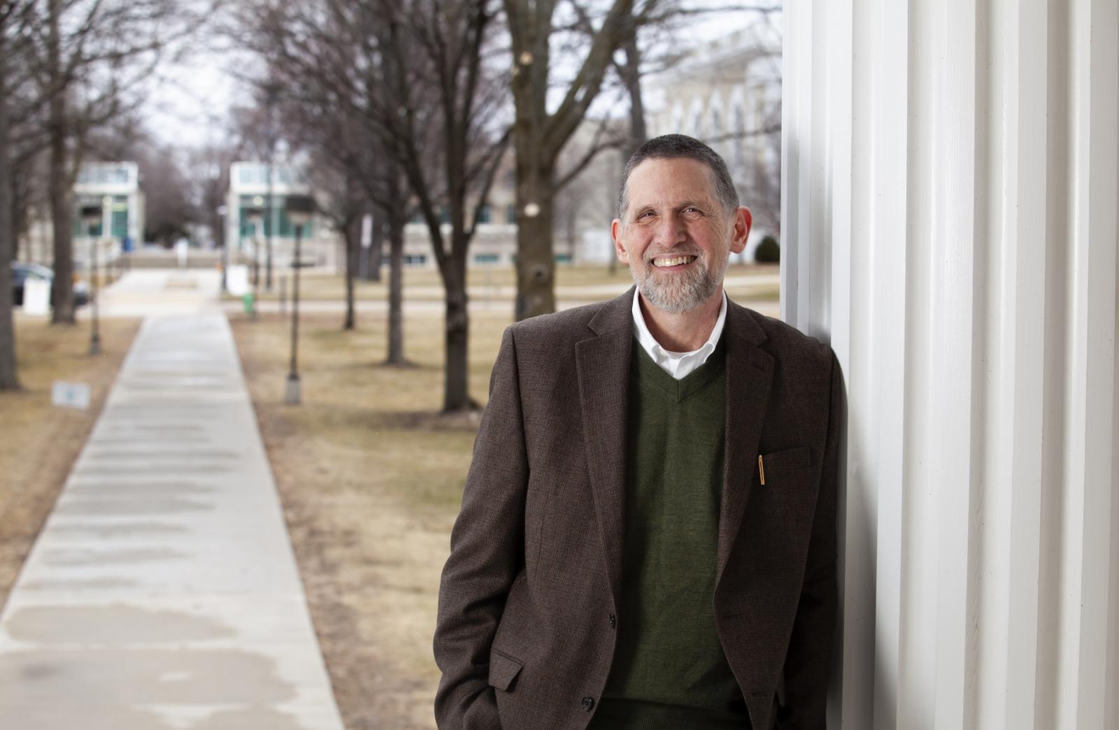 Peter Peregrine poses for a photo near Main Hall.