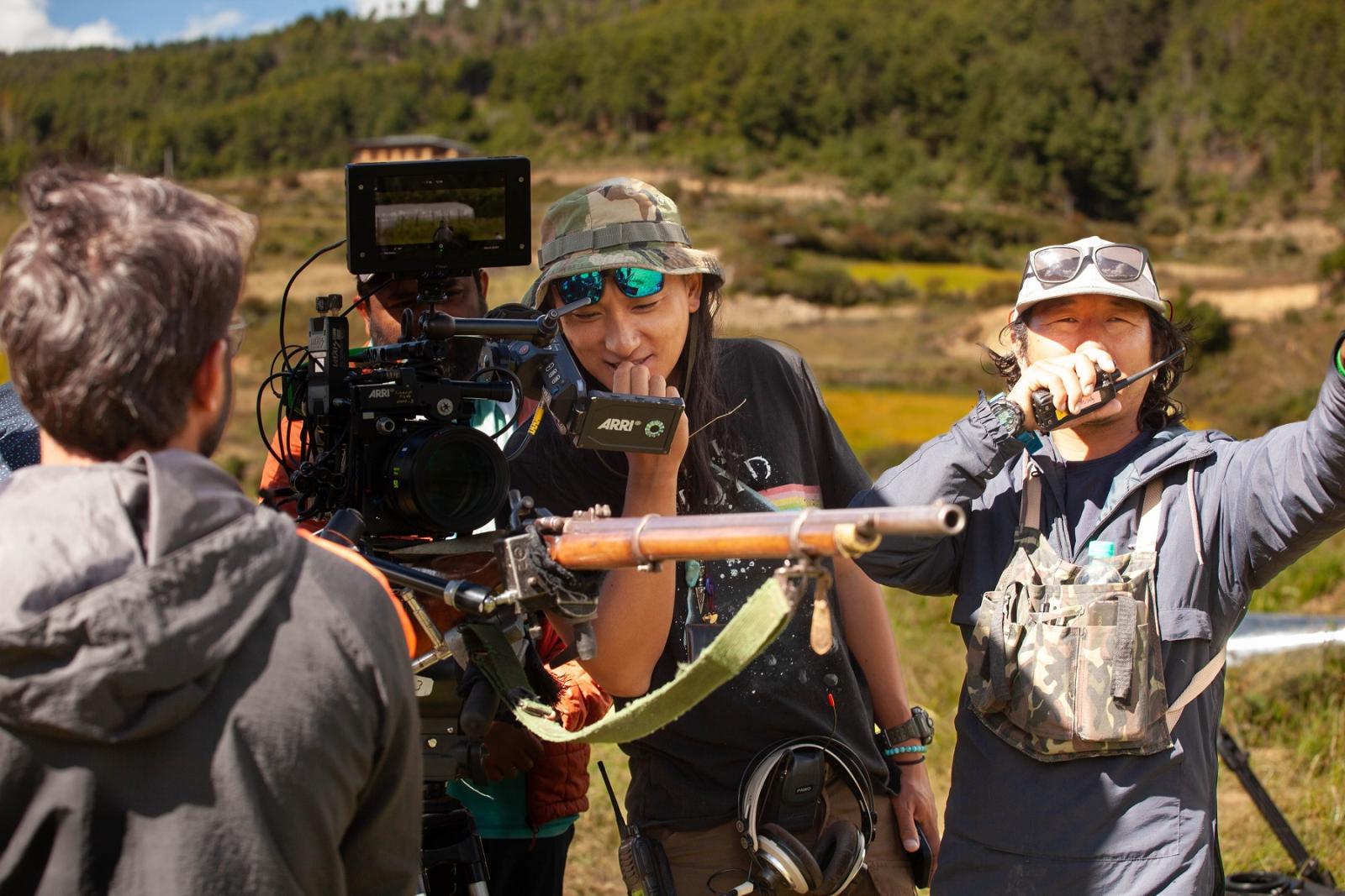 Pawo Choyning Dorji leads his film crew during the making of "The Monk and the Gun" in Bhutan.