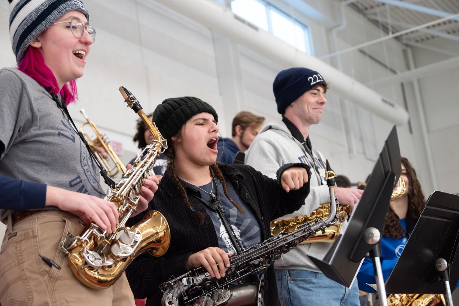 Students perform as part of the Lawrence University Pep Band at a women's hockey game earlier this year. 