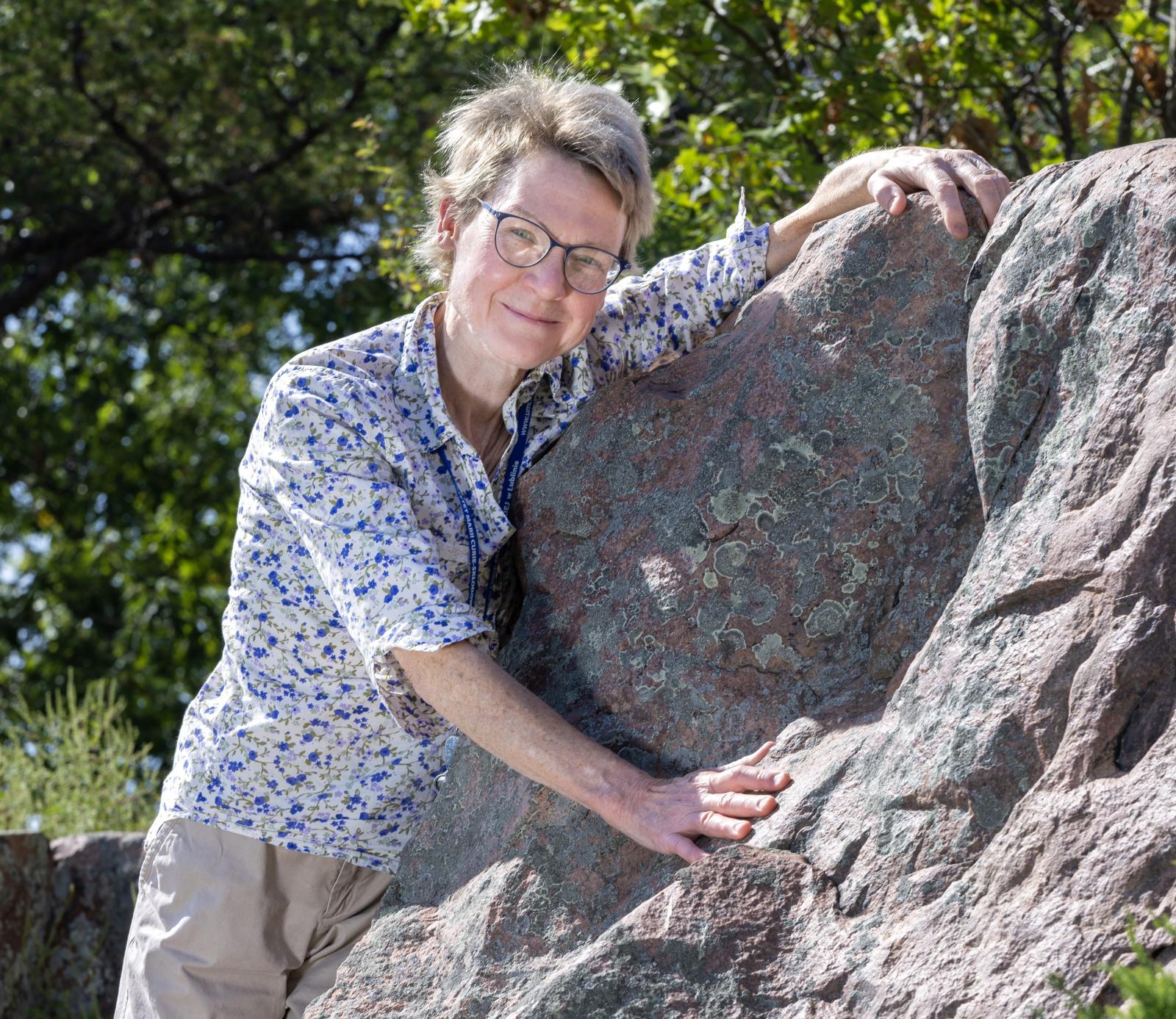 Marcia Bjornerud poses for a photo at Cactus Rock near New London.