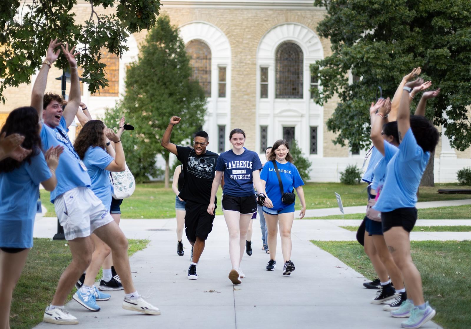 New students process to the President's Welcome in 2023.