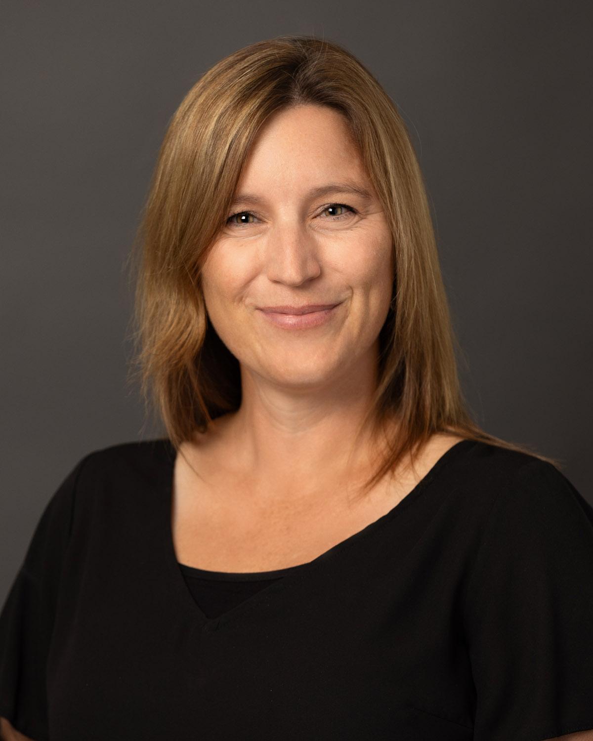 Headshot of Shannon Gravelle, associate professor of music (choral studies).