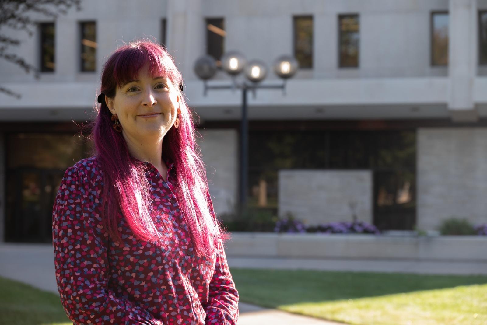 Angela Vanden Elzen poses for a photo on Main Hall Green.