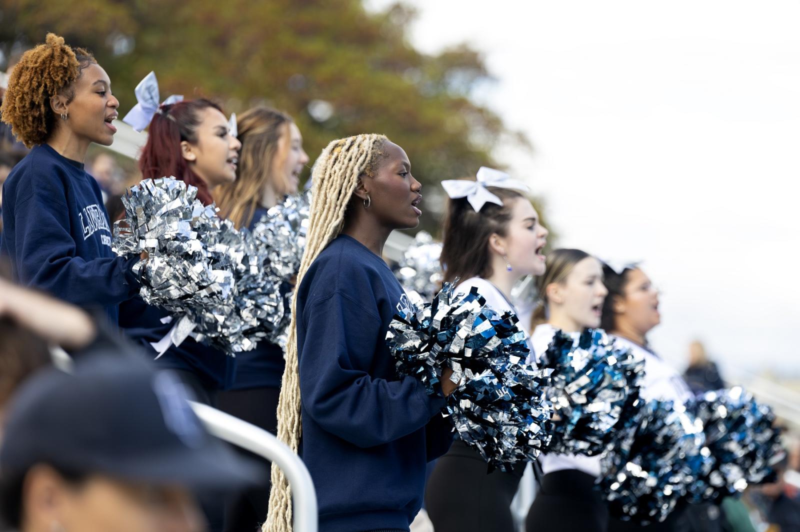 Cheerleaders root on the Vikings during the 2023 Homecoming football game.