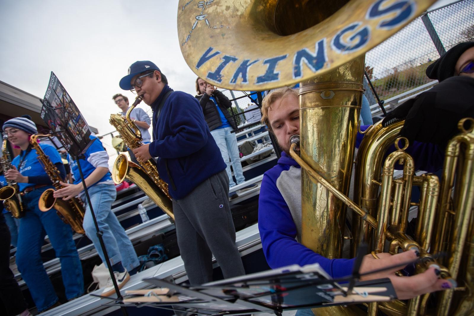 Pep band performs during Homecoming football game.