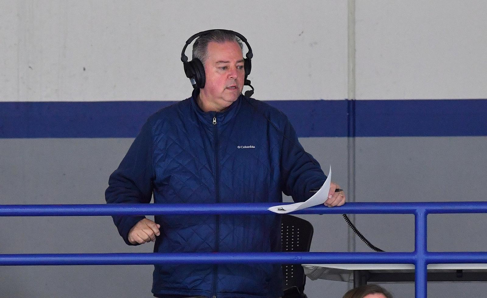 Joe Vanden Acker calls a Lawrence hockey game on a webcast. 