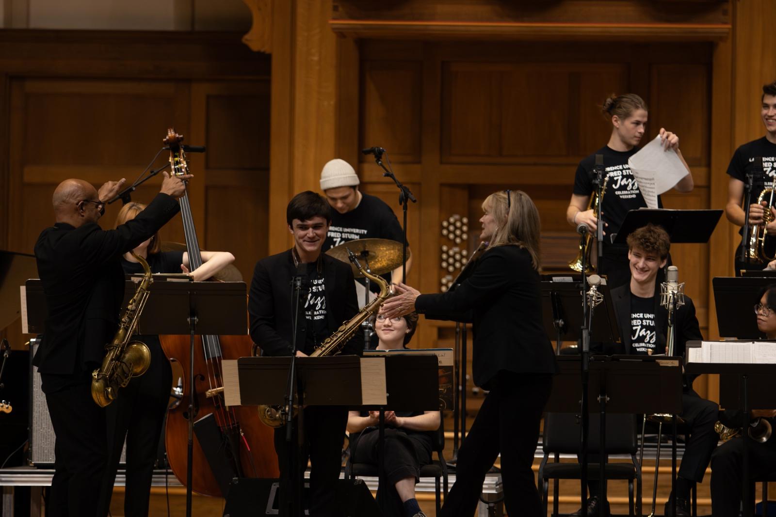 Patty Darling and Jose Encarnacion lead students in a performance in Memorial Chapel during the 2023 Jazz Celebration Weekend.