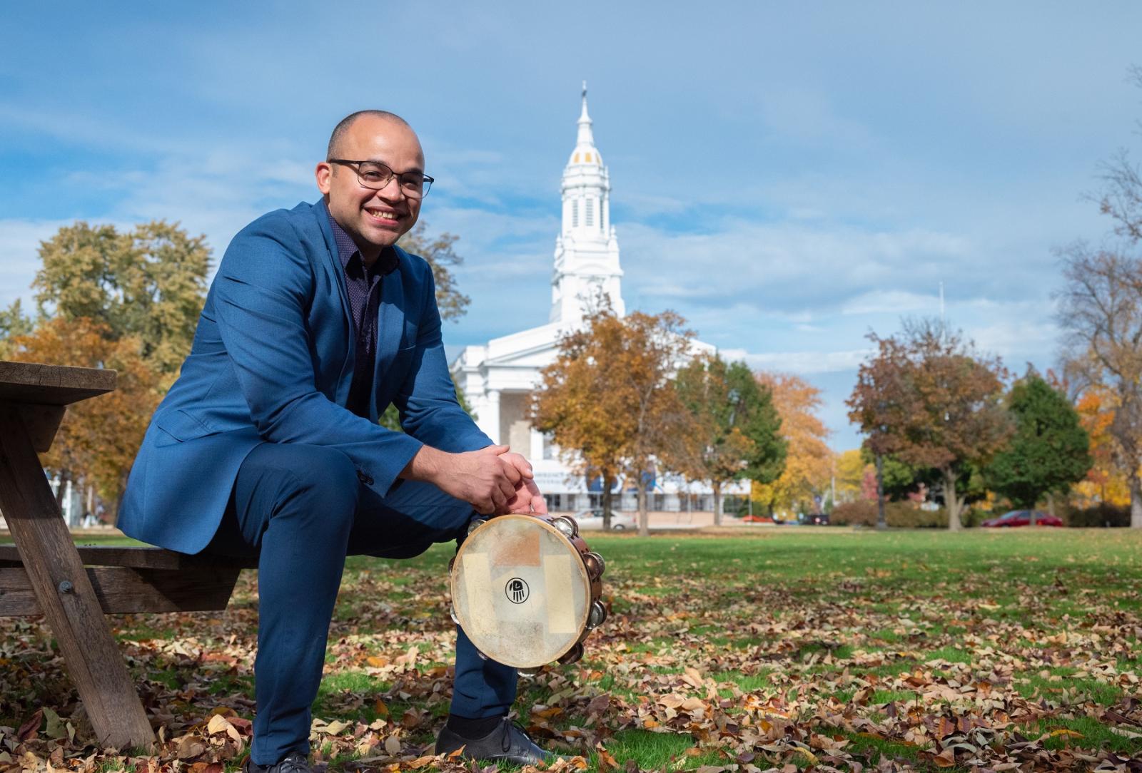 Jean Carlo Ureña González poses for a portrait on Main Hall Green with Memorial Chapel in the background.