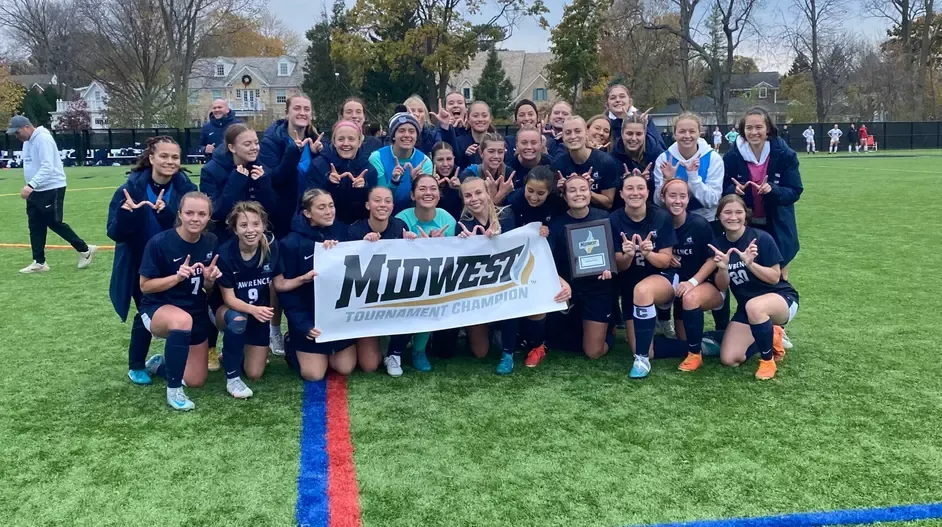 Lawrence women's soccer team celebrates conference tournament championship.