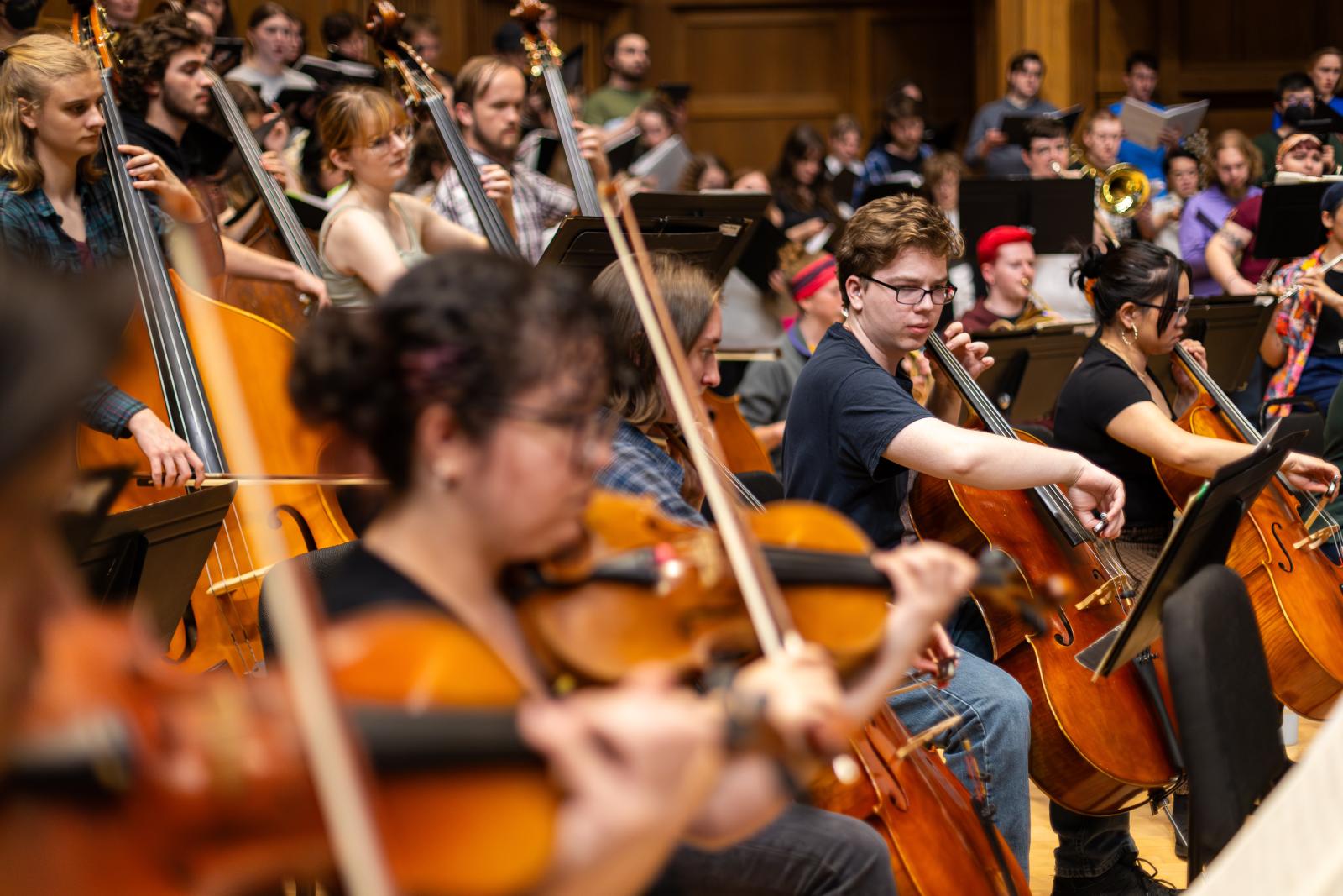 Students perform on stage at Memorial Chapel.