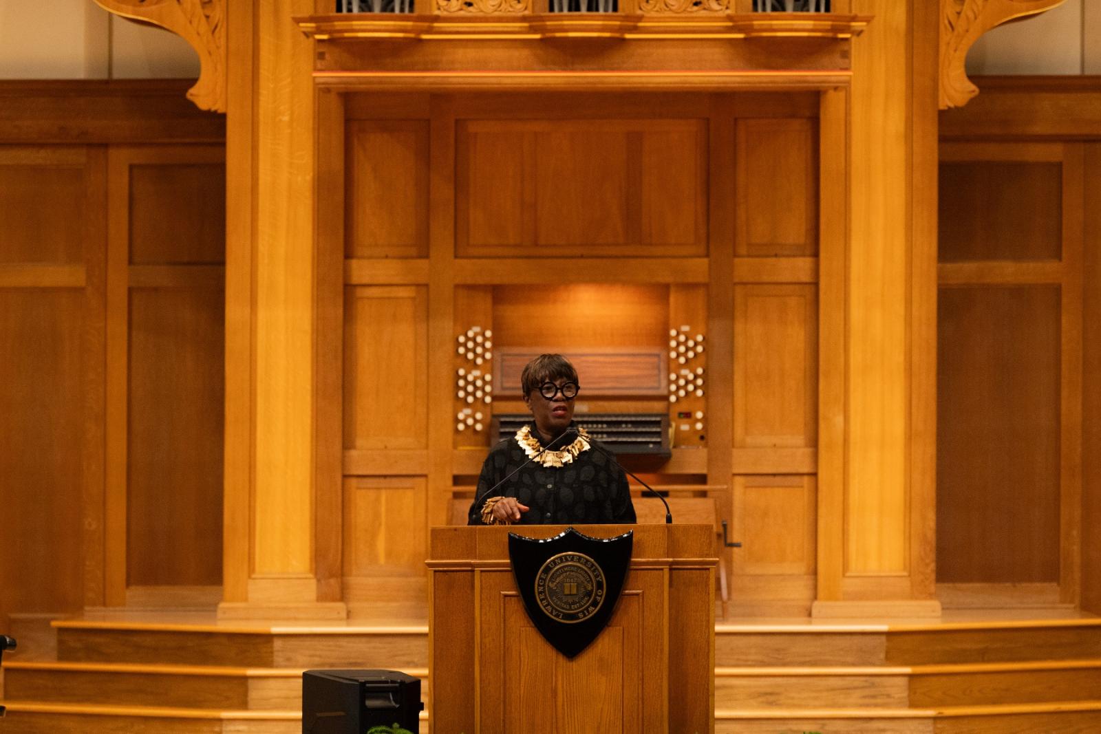 Patricia Smith delivers her Convocation address from the stage of Memorial Chapel.