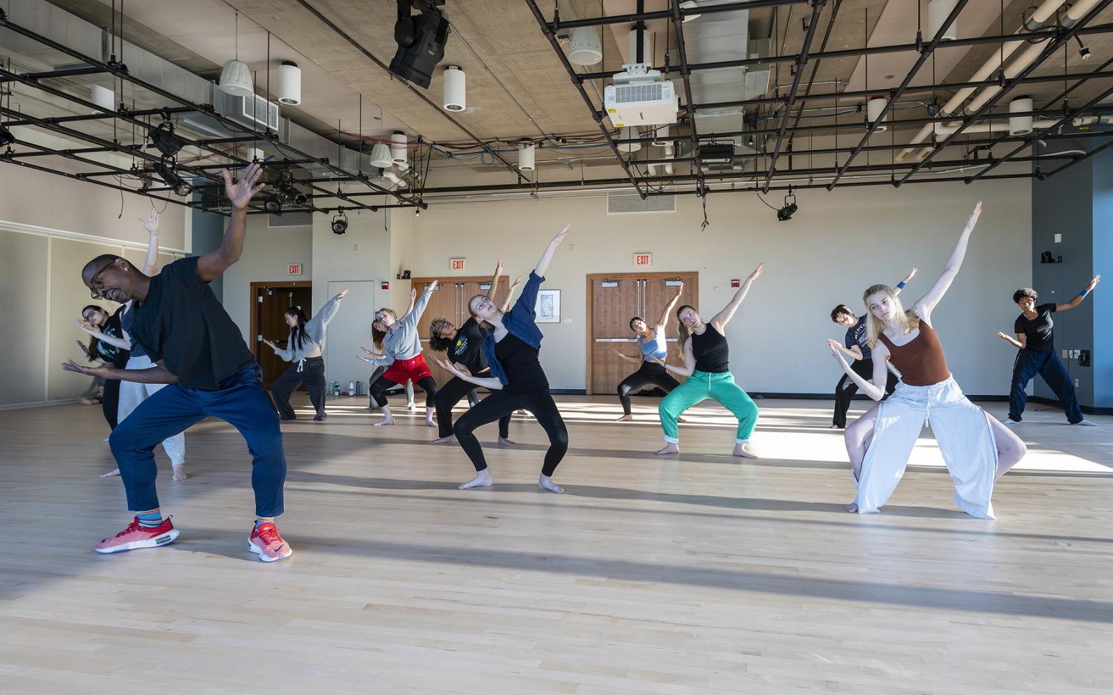 Robert Battle leads students in dance instruction in Warch Campus Center.