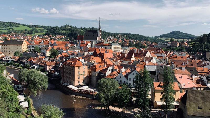 Landscape view of small town on the river in the Czech Republic hills