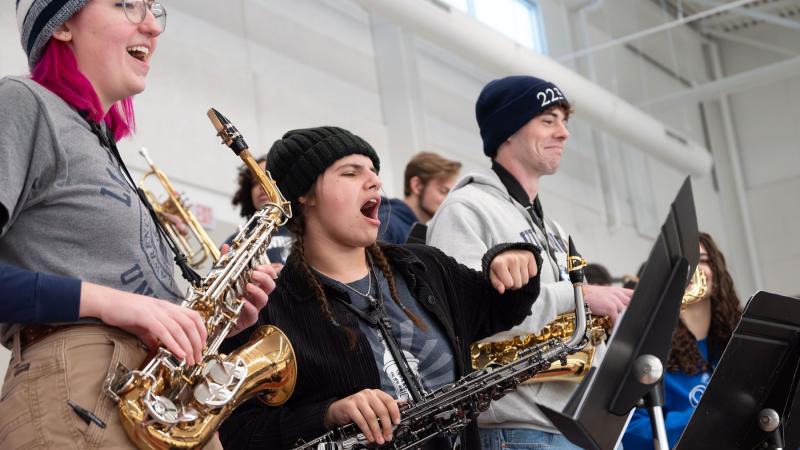 Students perform as part of the Lawrence University Pep Band at a women's hockey game earlier this year. 