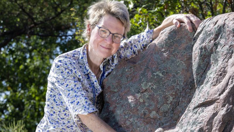 Marcia Bjornerud poses for a photo at Cactus Rock near New London.