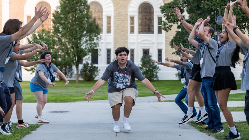 A student is celebrated at the Welcome Week Kickoff event.