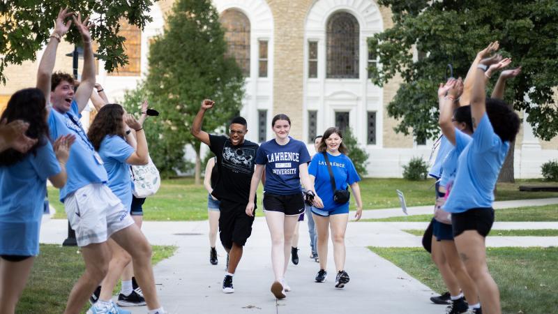 New students process to the President's Welcome in 2023.