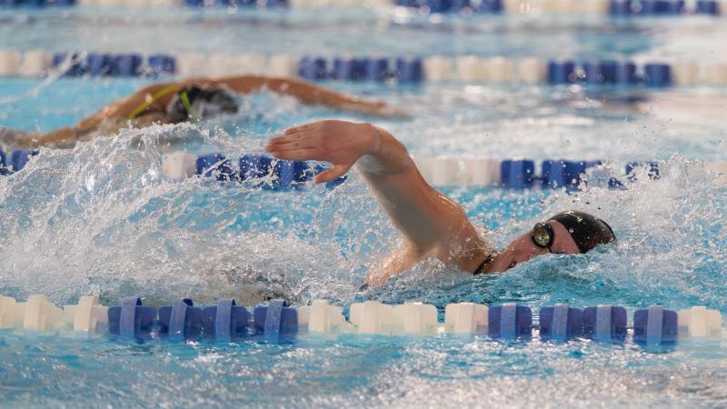 Swimmers compete in the pool in the Buchanan Kiewit Wellness Center.