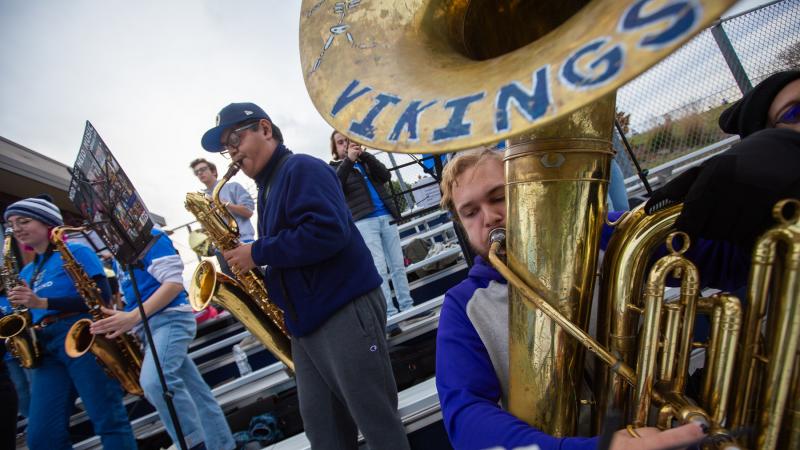 Pep band performs during Homecoming football game.