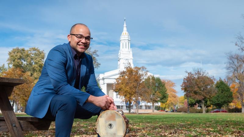 Jean Carlo Ureña González poses for a portrait on Main Hall Green with Memorial Chapel in the background.