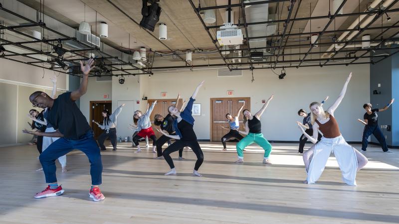 Robert Battle leads students in dance instruction in Warch Campus Center.