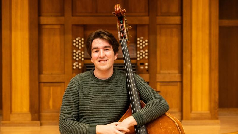 Ben Lewis poses for a photo on the Memorial Chapel stage.